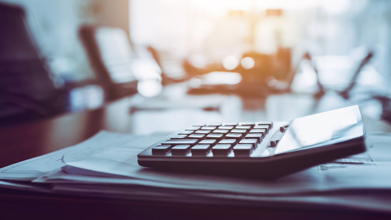 Business calculator sitting on desk