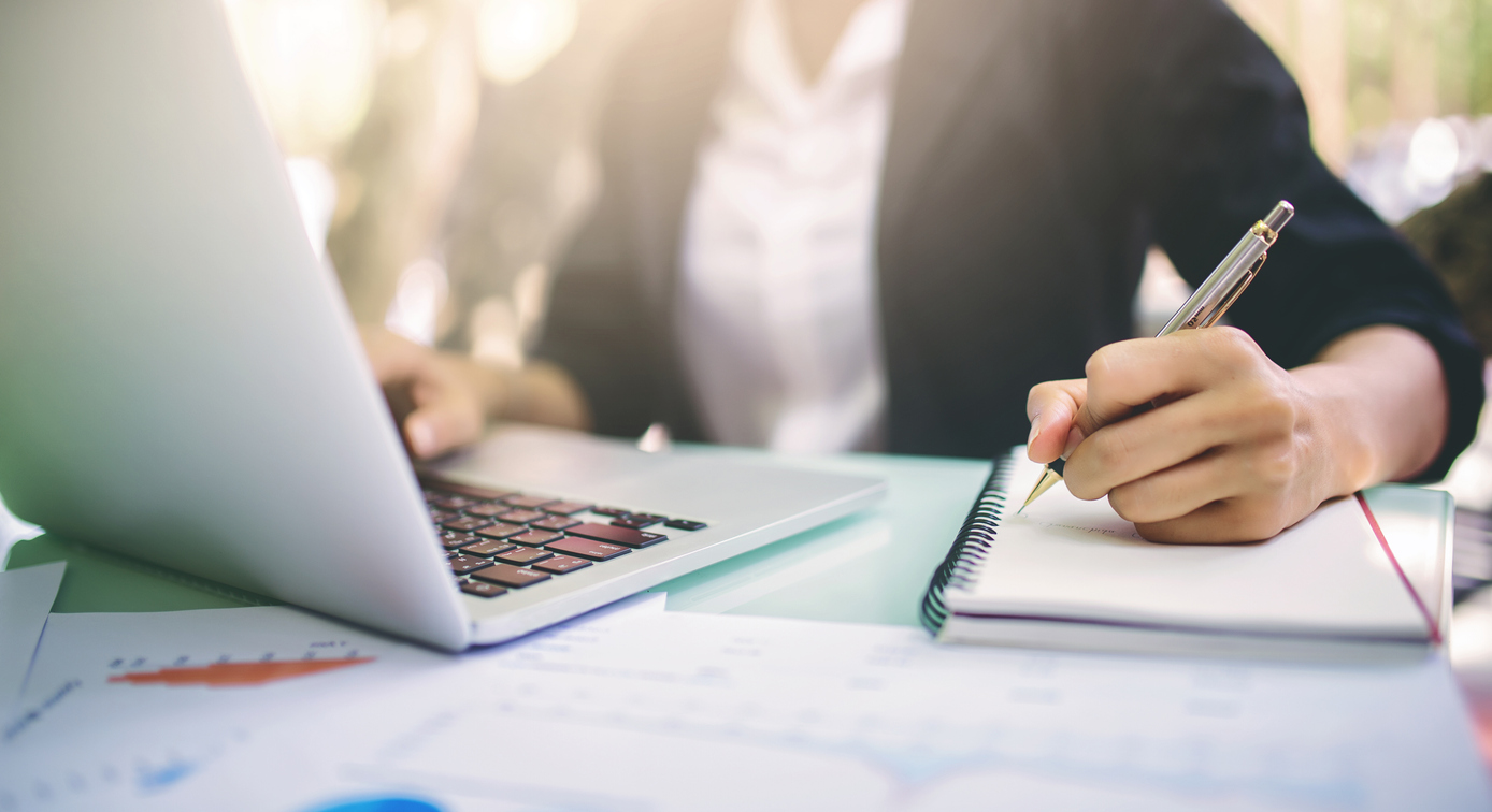 Businesswoman completing an online training course