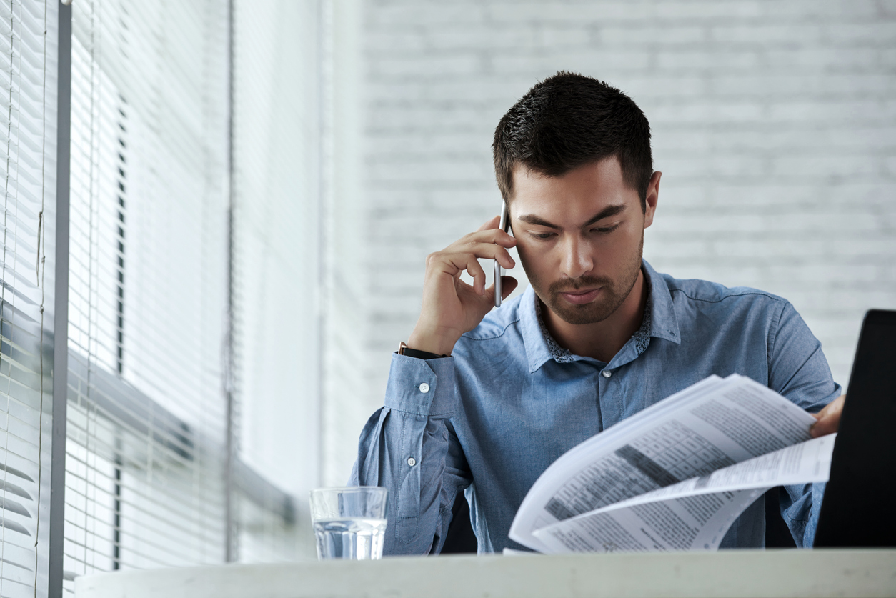 Entrepreneur reading a business report