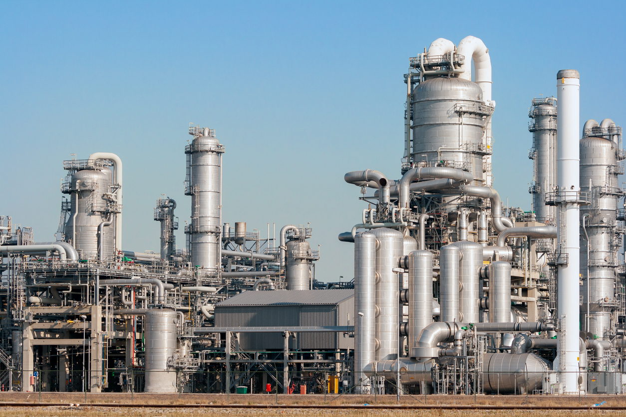 An oil refinery on a clear day