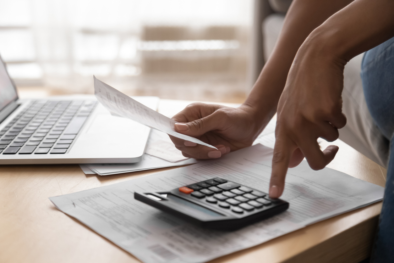 Young woman analysing credit report