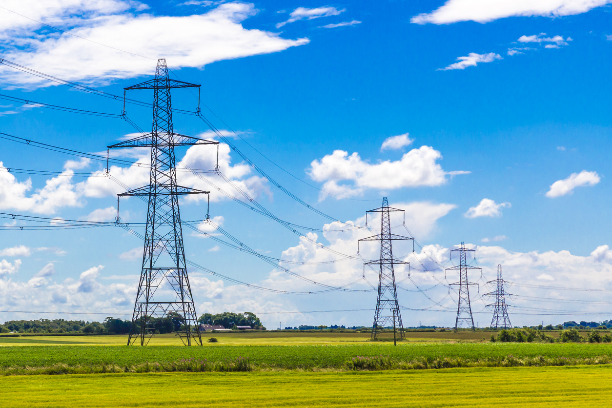 Row of pylons in the English countryside