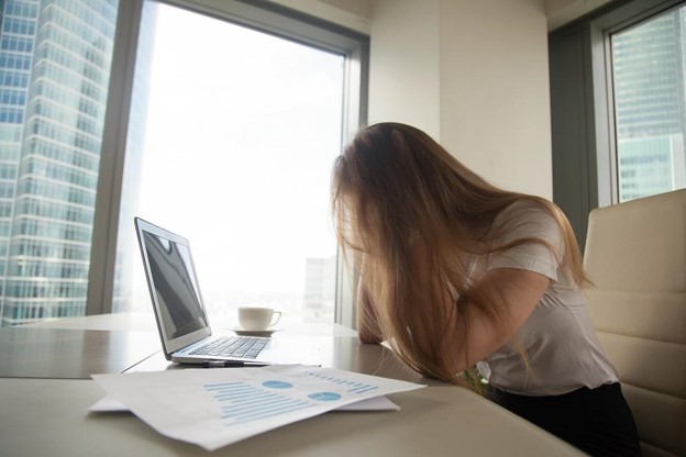 Bankrupt woman reading credit report