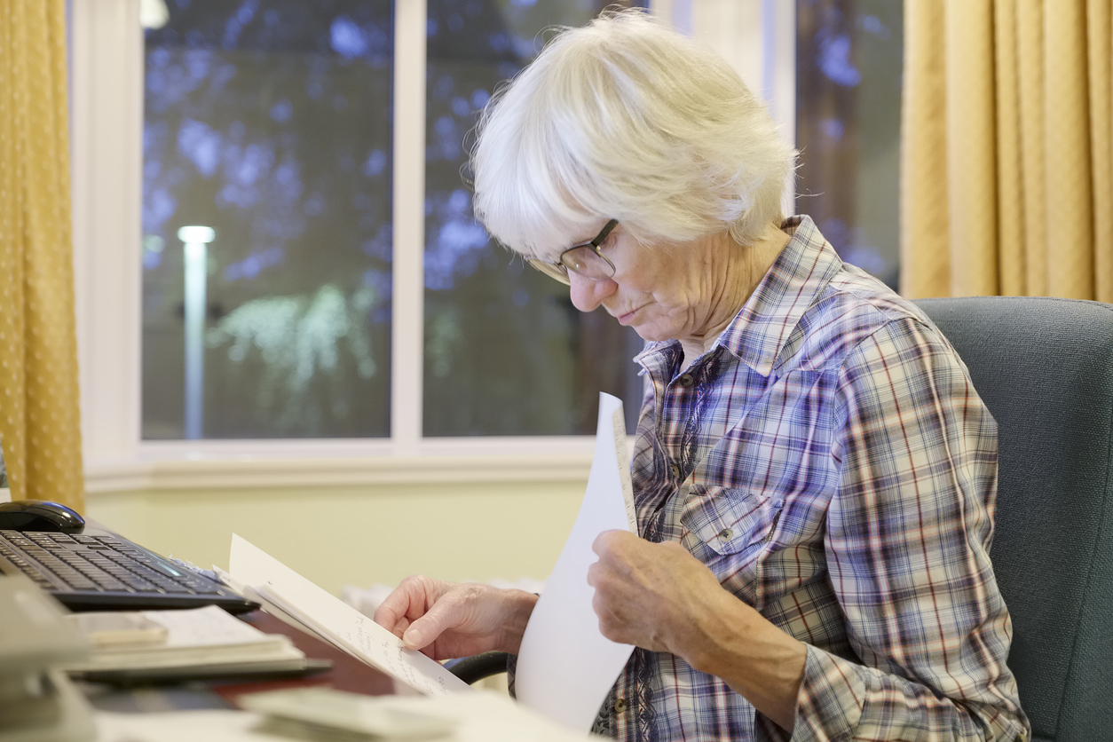 Older woman reviewing her finances