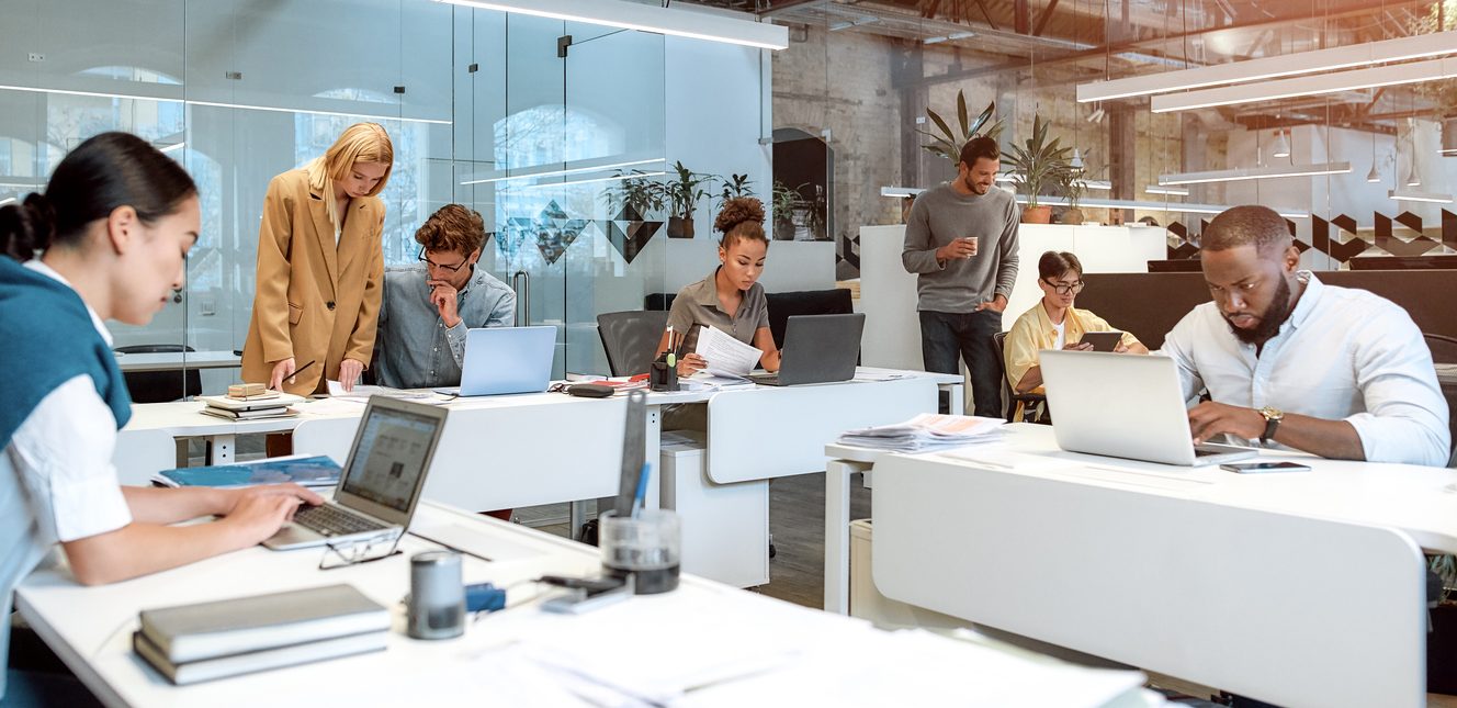 Multiracial employees in a modern office space