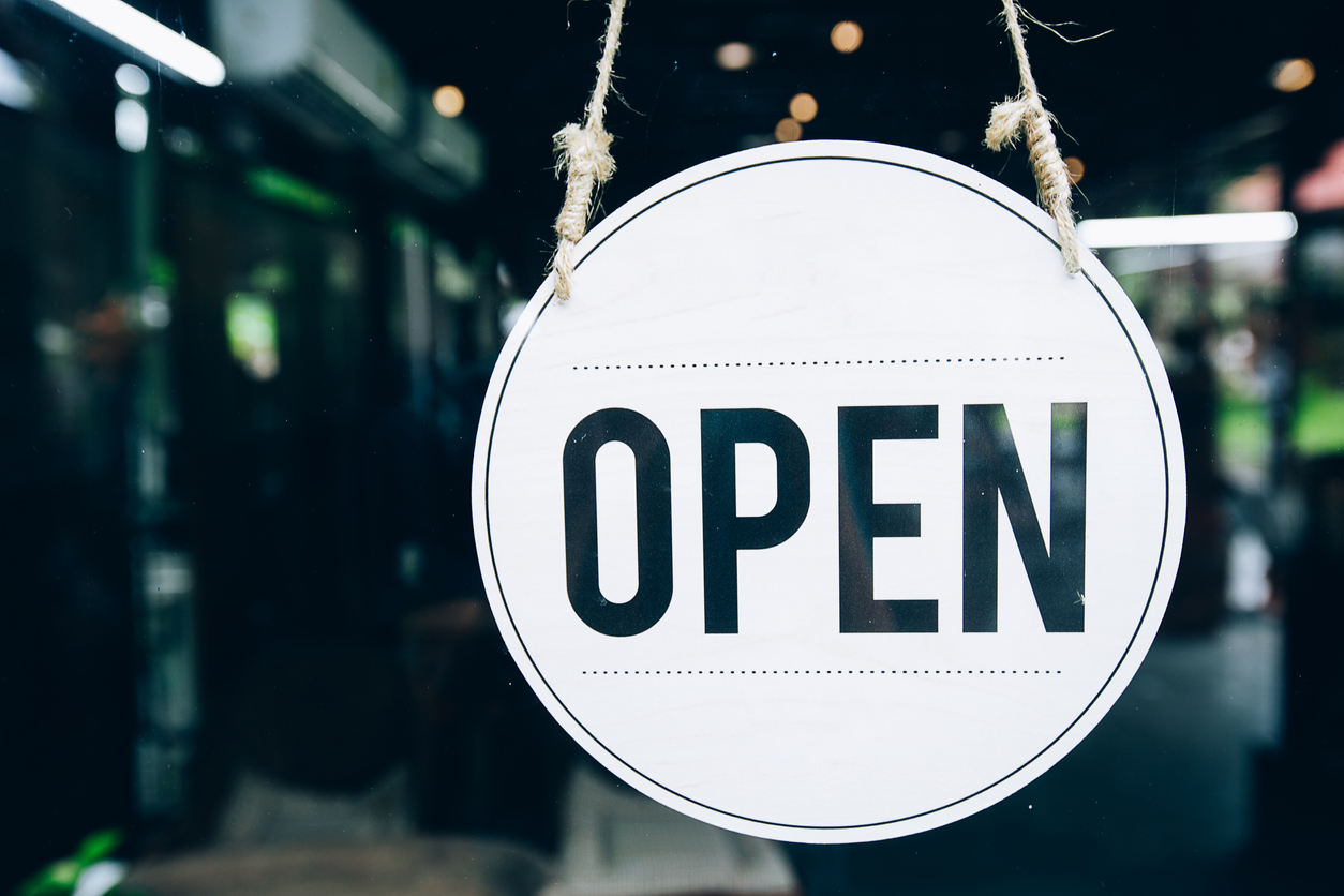 Open sign in a coffee shop window