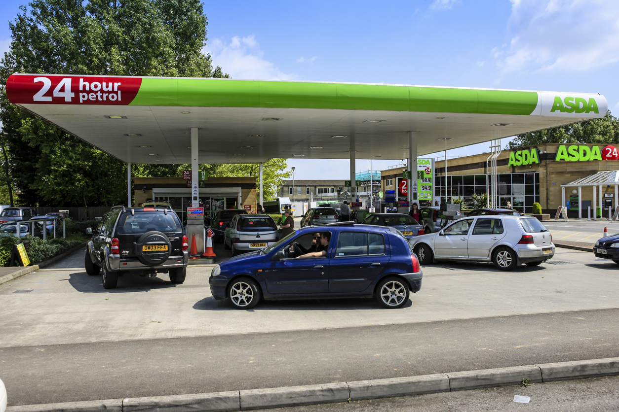 Vehicle queuing at petrol station, UK.