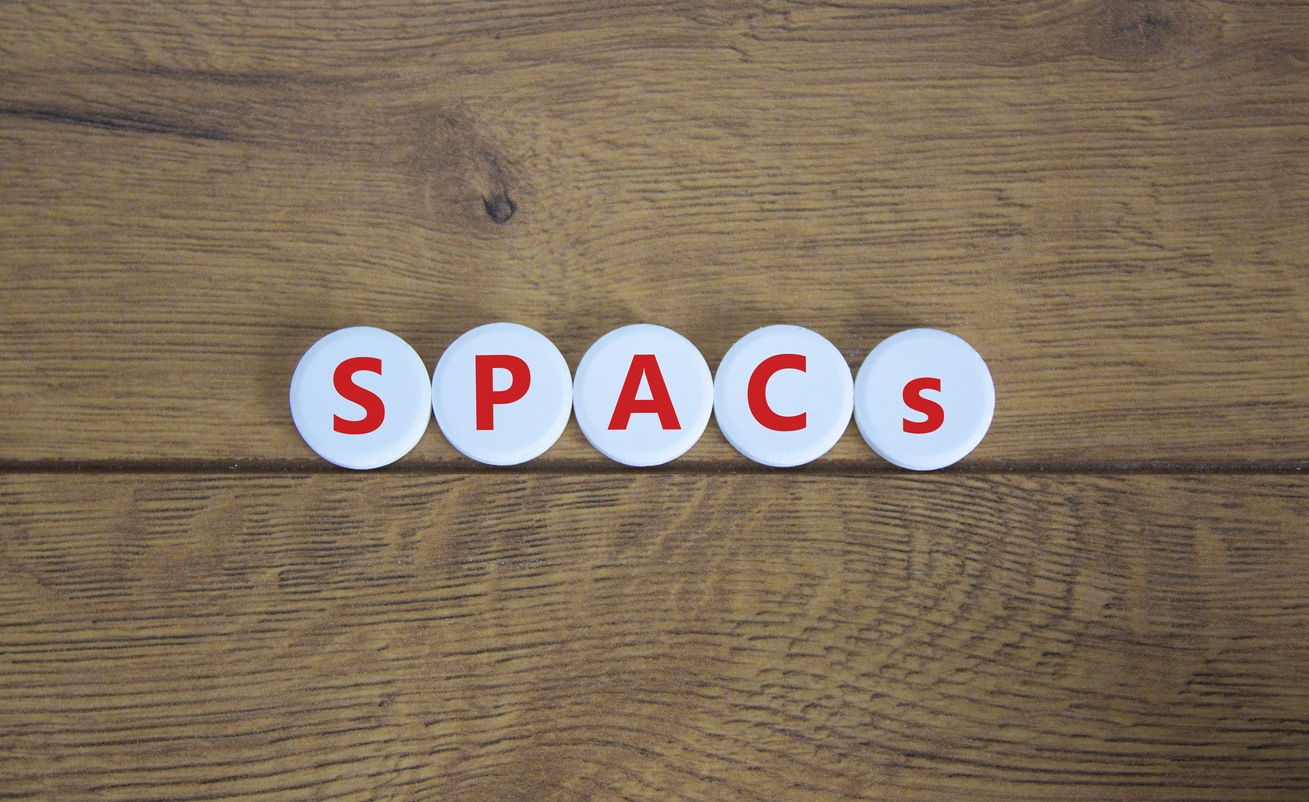 SPACs symbol. White circles with words "SPACs."