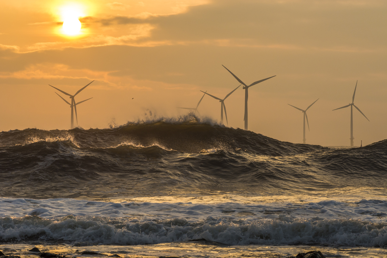 Wind turbines at sunrise off the North East UK coast