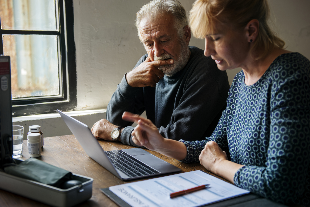 Couple purchasing life insurance plan