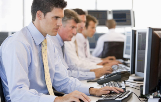 Trader at desk