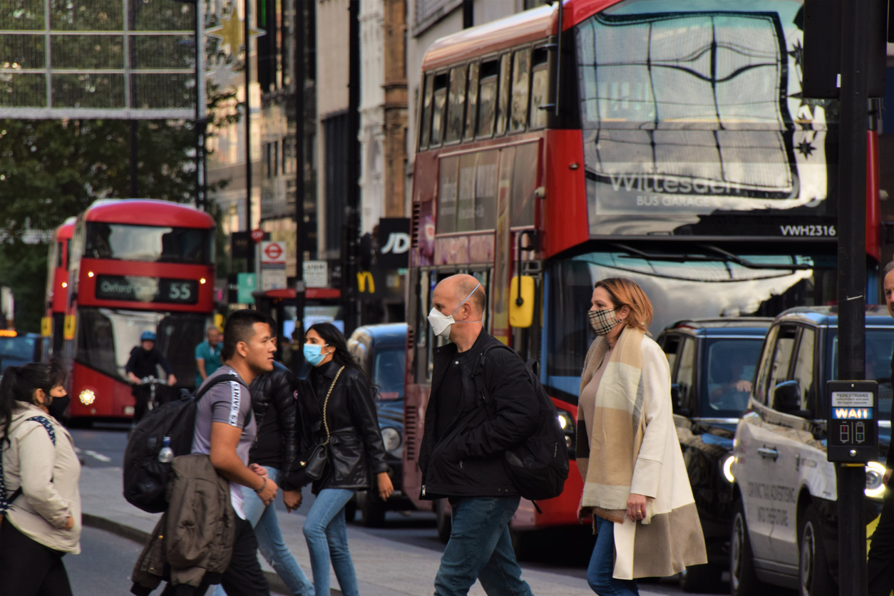 People wearing face masks, London, UK.