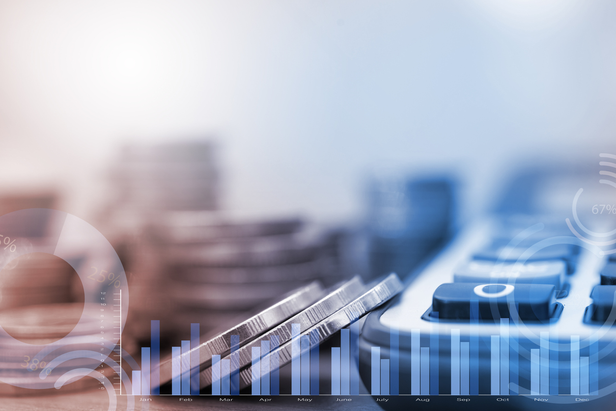 Row of coins, financial graph and calculator with blank space for finance background