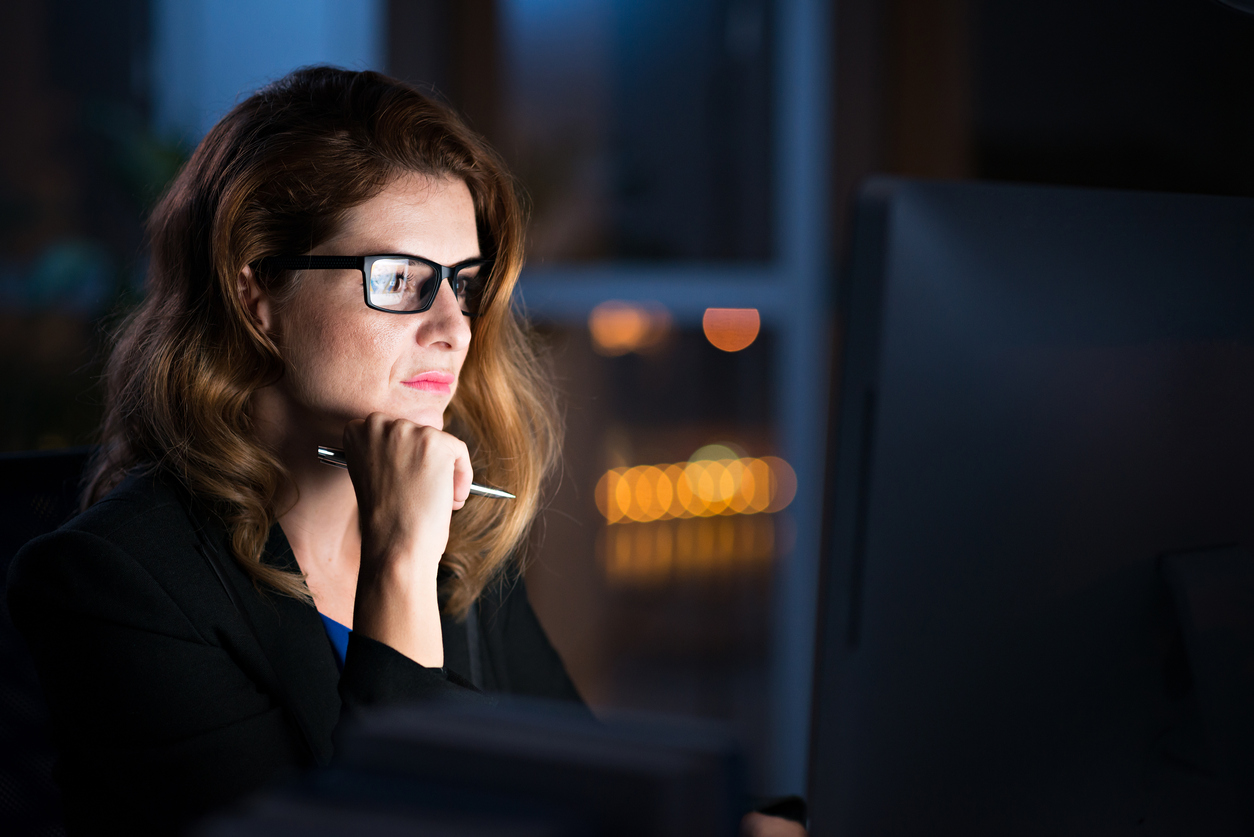 Female investor at desk