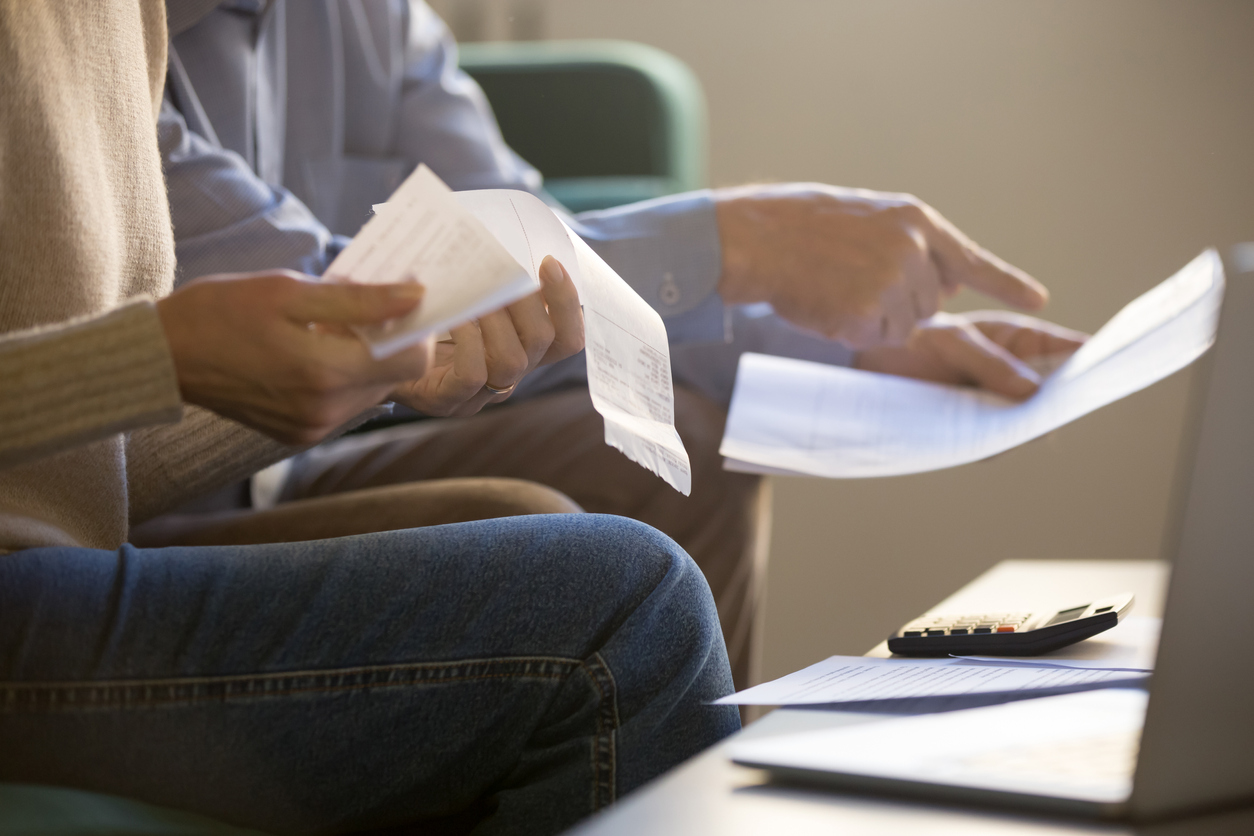 Couple looking at household bills