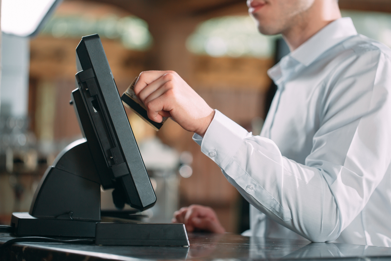 Employee using POS system