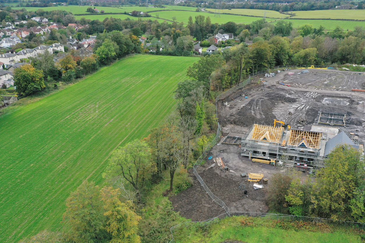 House development construction site in progress aerial view