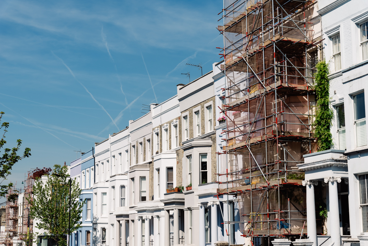 Traditional townhouses in Notting Hill, one of which is being restored