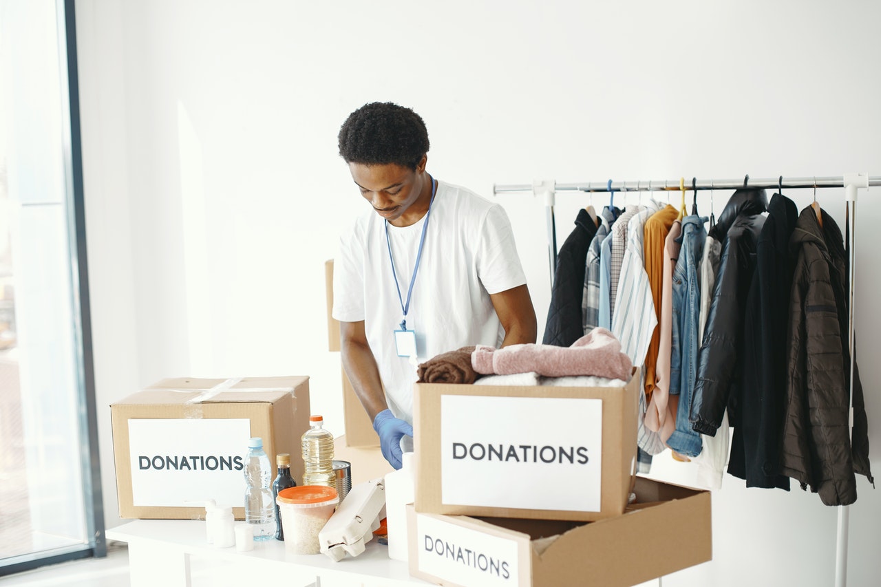 Non-profit worker packing boxes