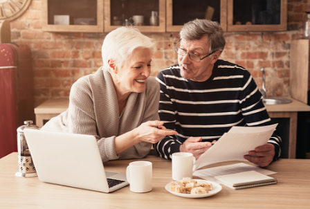 Retired couple looking at their finances