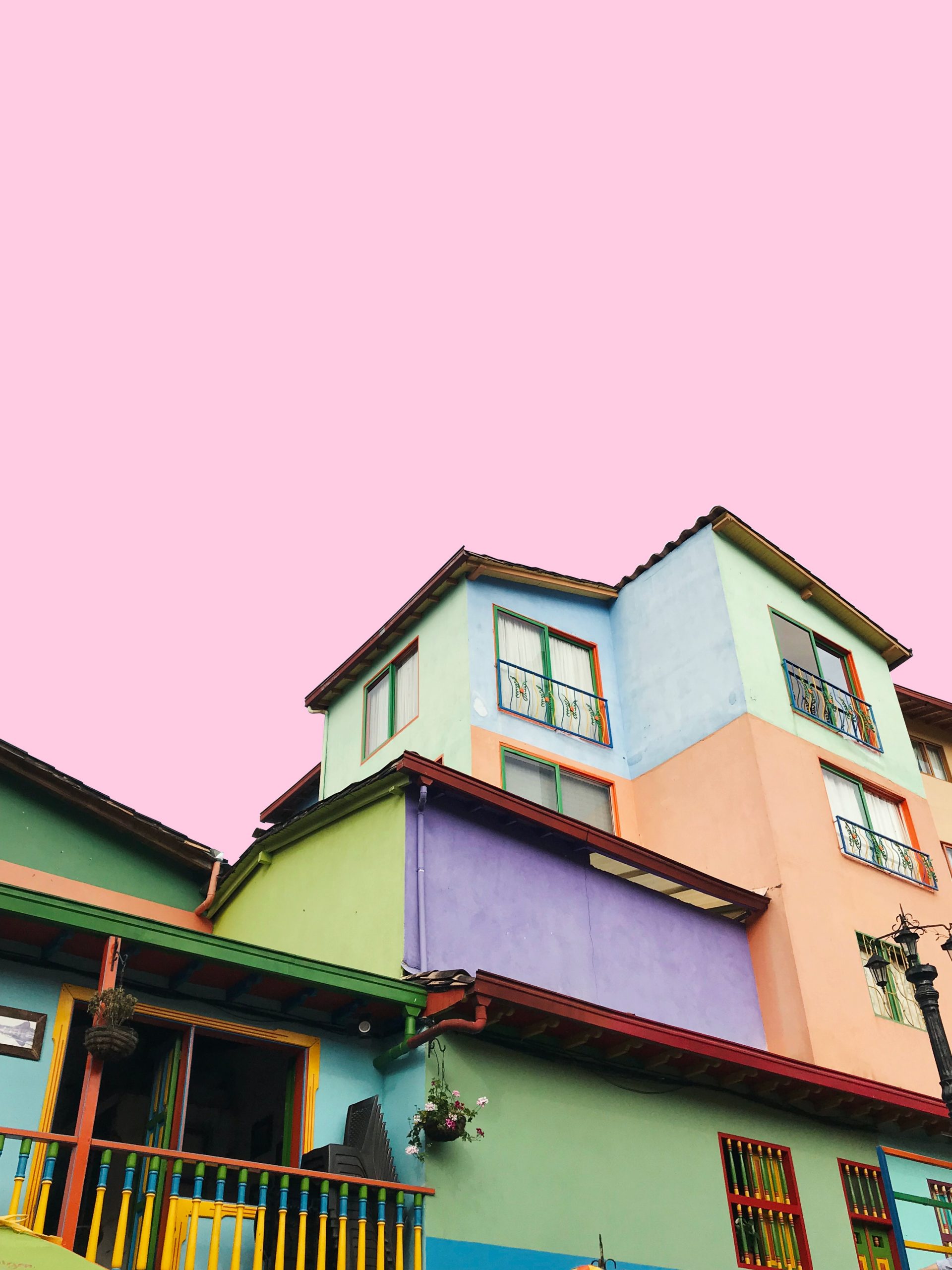 Colourful house and pink sky