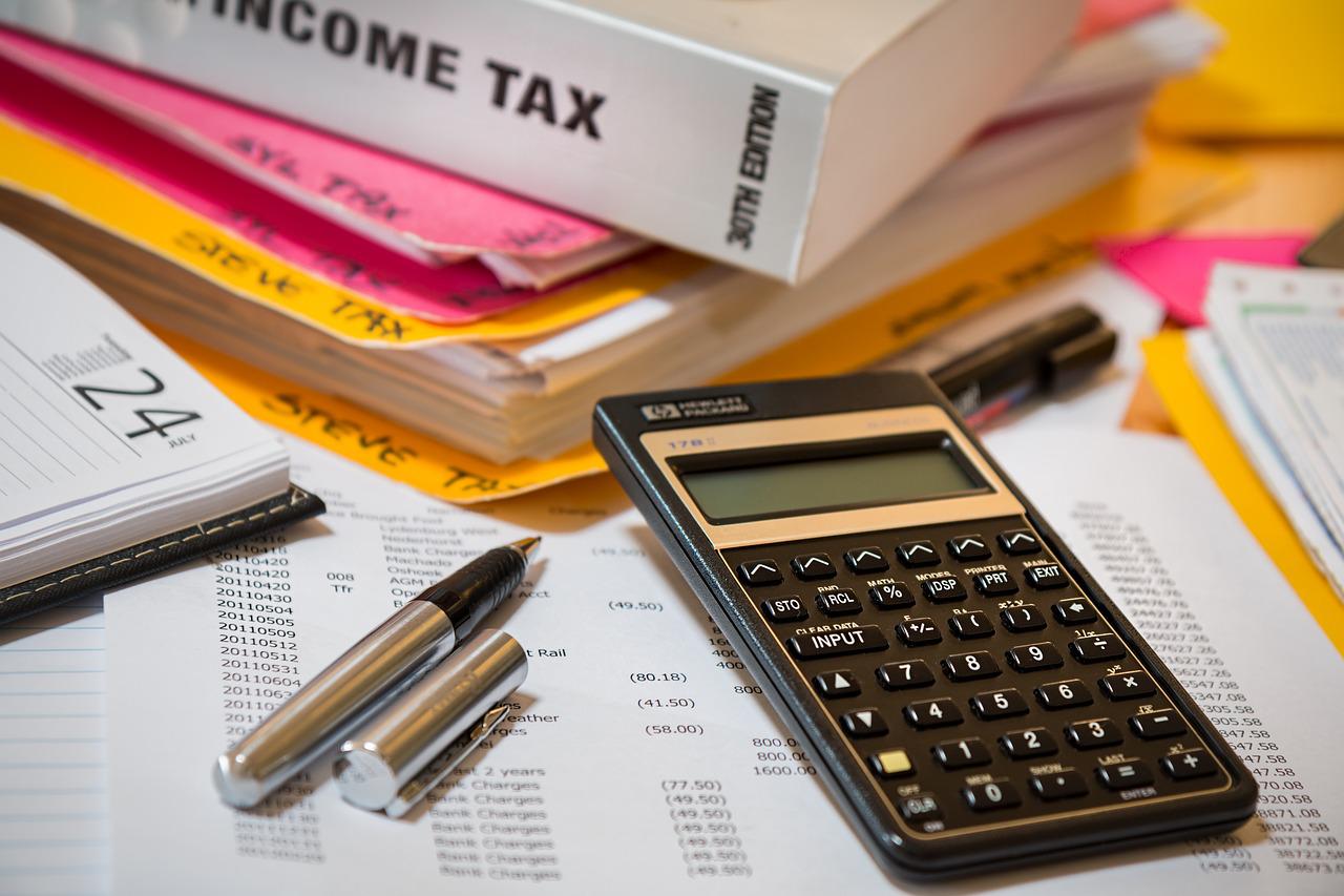 Calculator next to income tax book