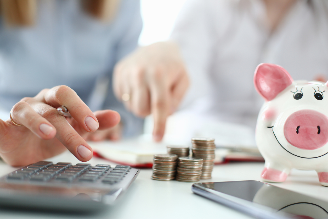 Man and woman looking at personal finances