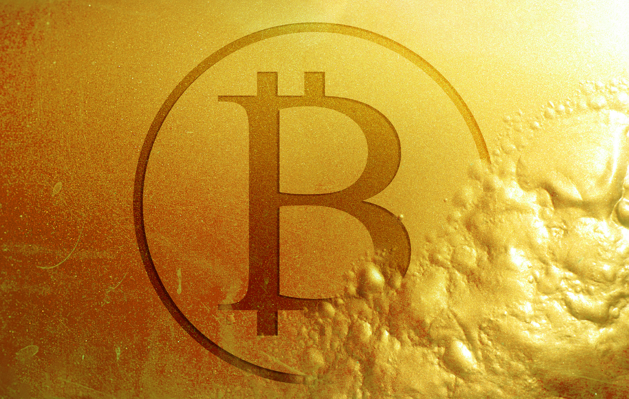 Bitcoin symbol on gold background