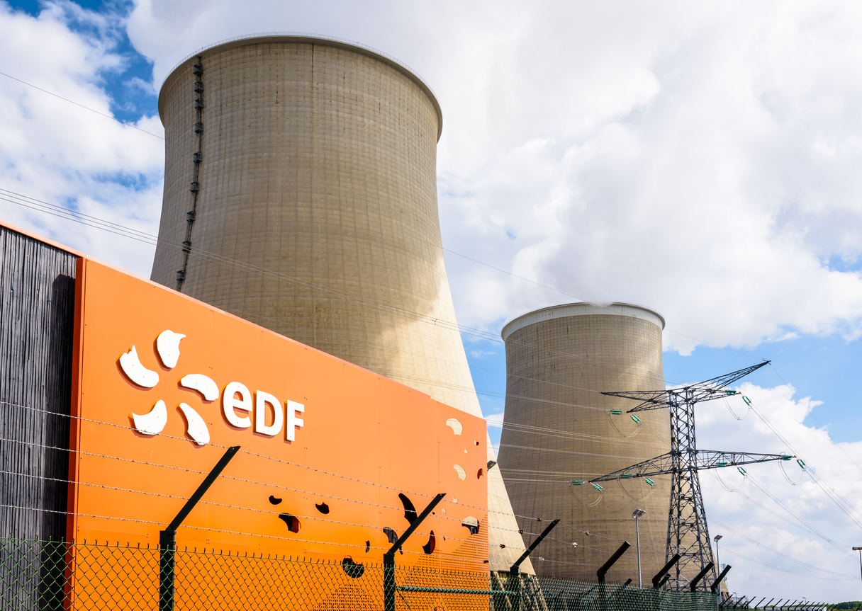 EDF sign and cooling towers of the nuclear power plant of Nogent-sur-Seine, France.