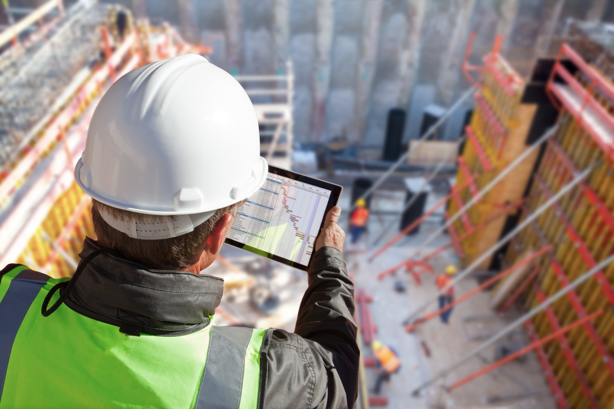 top view of construction site with multinational worker