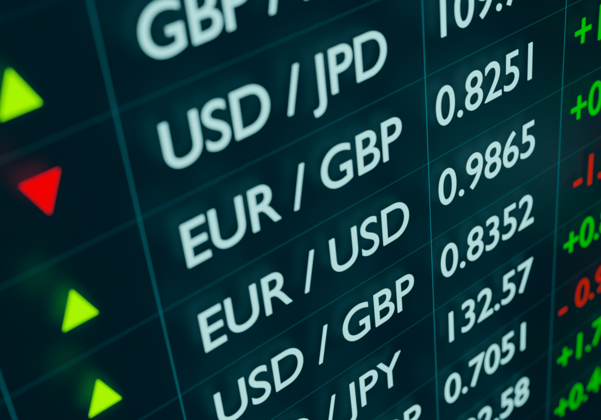 currency information board with exchange rates like euro against us dollar.