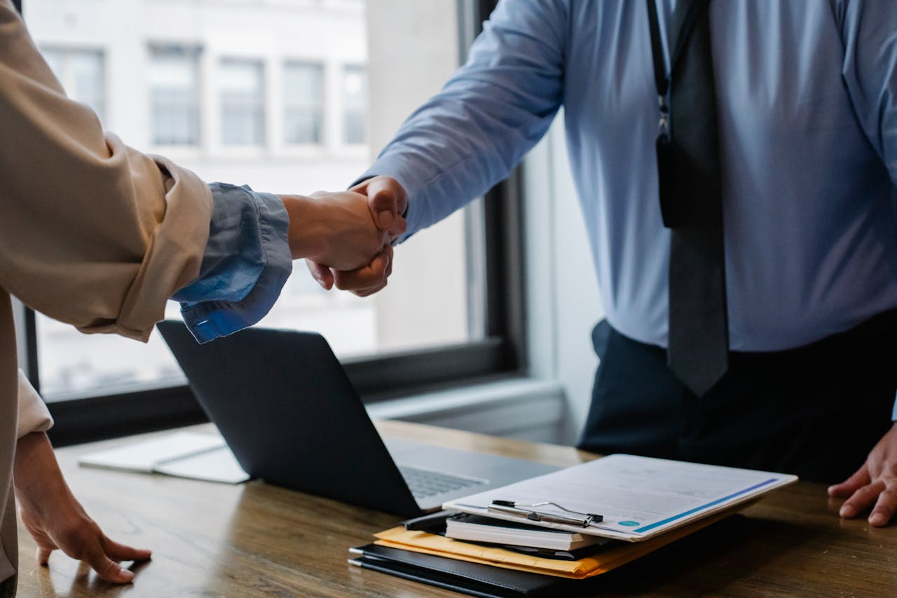 Colleagues shaking hands