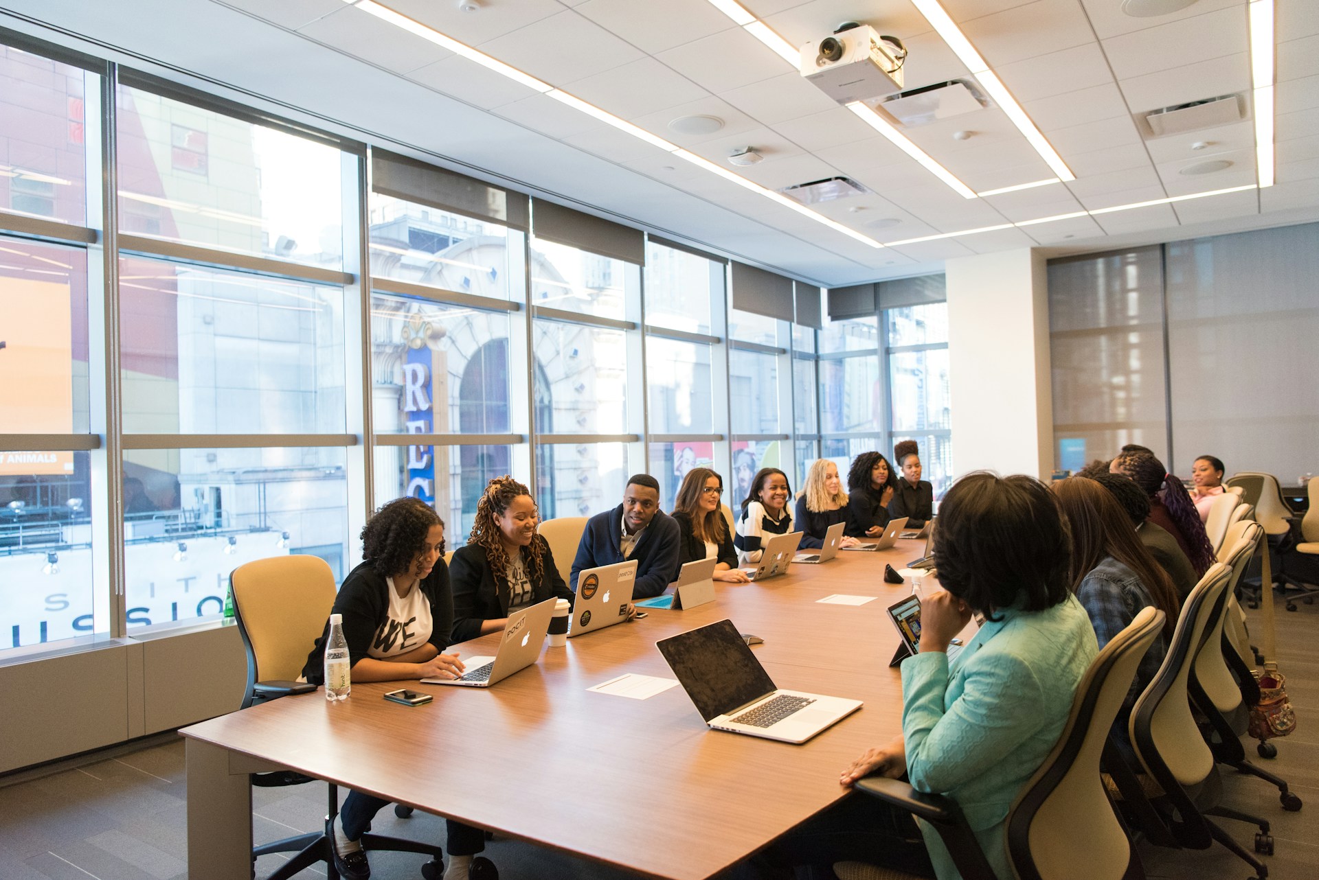 group of businesspeople around a large table.