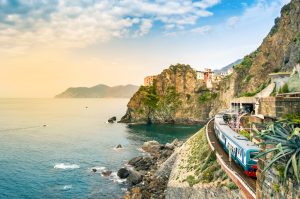 manarola, cinque terre train station in famous village with colorful houses on cliff over sea in cinque terre