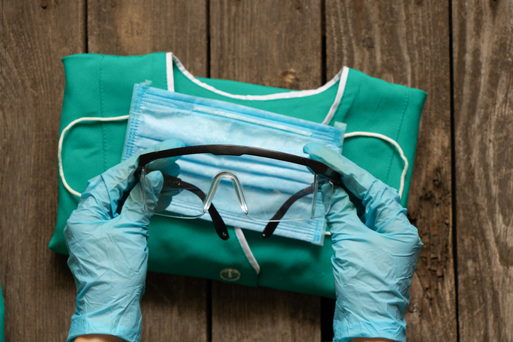 medical uniform set folded on an isolated background nurse in ukraine