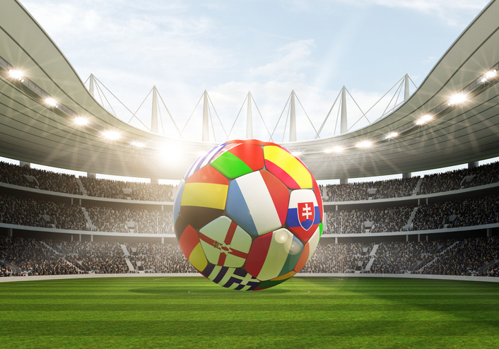 soccer stadium with a colorful ball in the middle