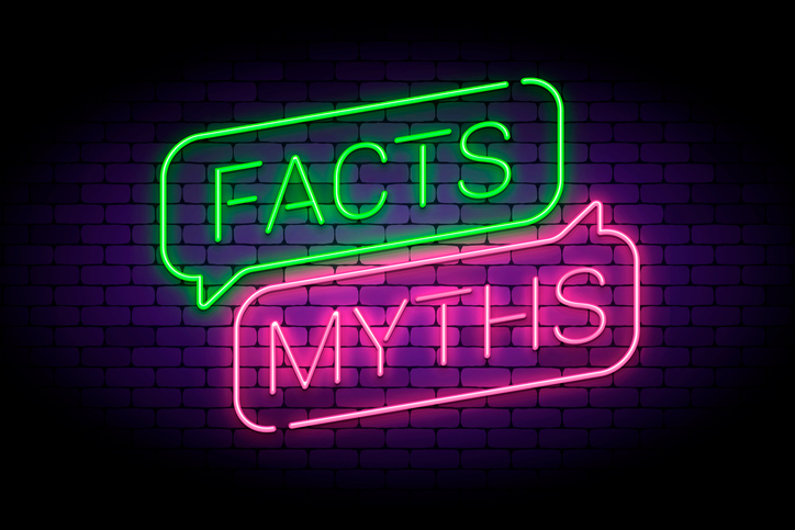 facts and myths sign in glowing neon style.