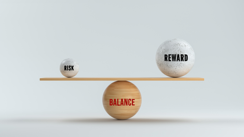 concept of balancing reward versus risk in business and life"n 3d illustration