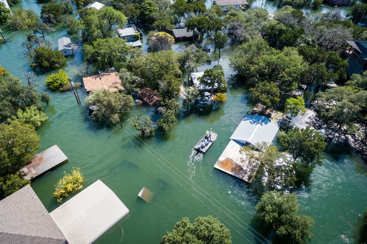 water rescue crew on site searching for survivors after dangerous flooding