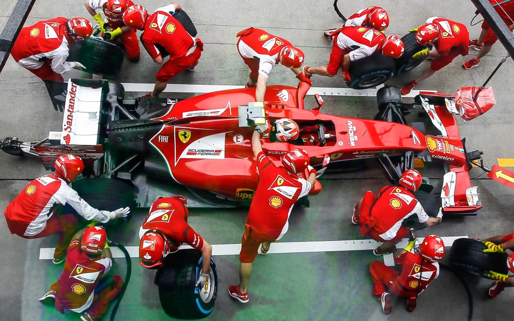 sepang,,malaysia,:,ferrari,team,driver,,kimi,raikkonen,,entering,crews