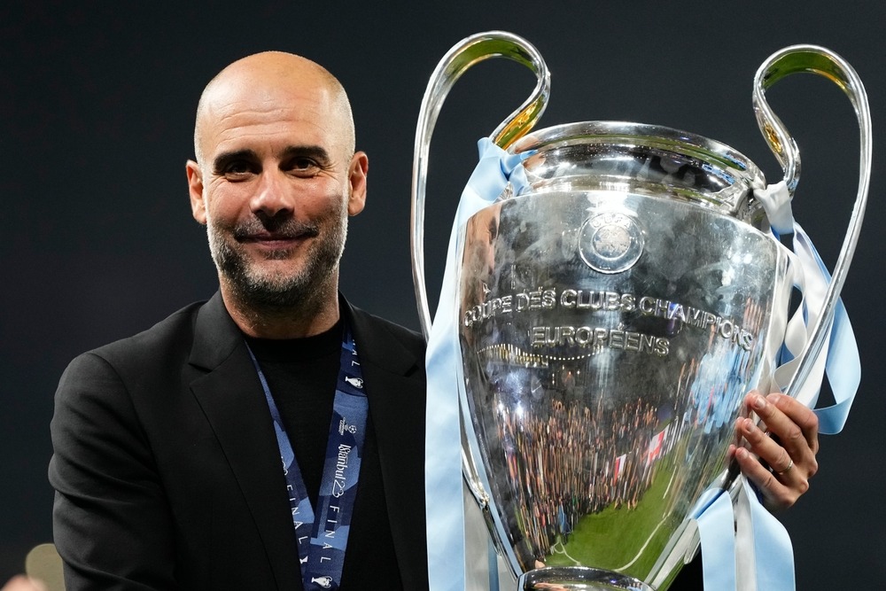 pep,guardiola,head,coach,of,manchester,city,celebrates,after,winning