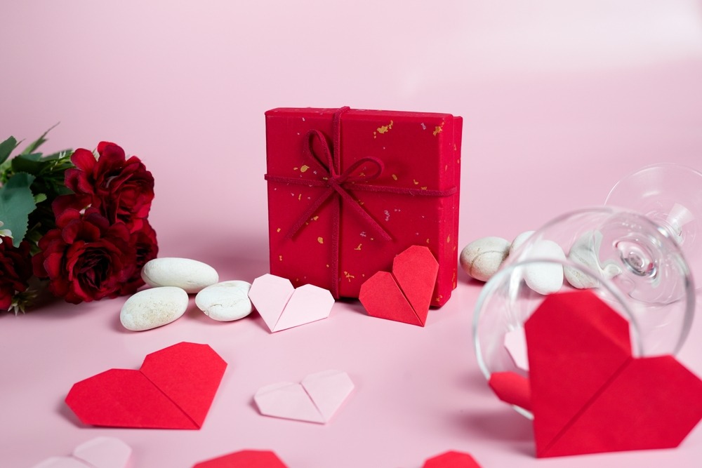 beautiful,composition,featuring,a,red,gift,box,,heart,origami,,and