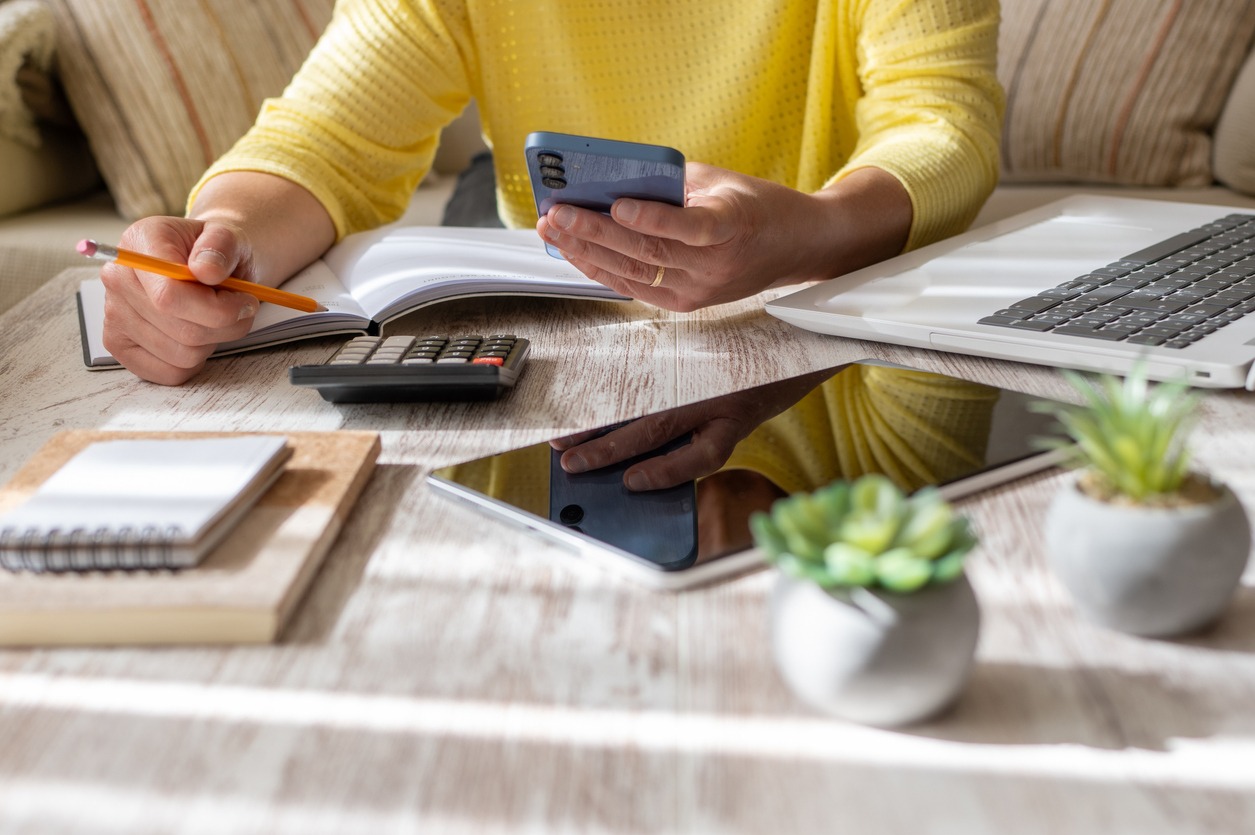 woman setting financial goals at home.