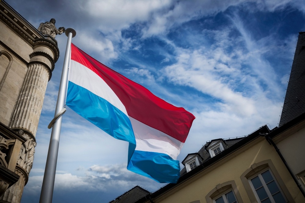 luxembourg,flag,flying,among,historic,buildings,in,the,capital